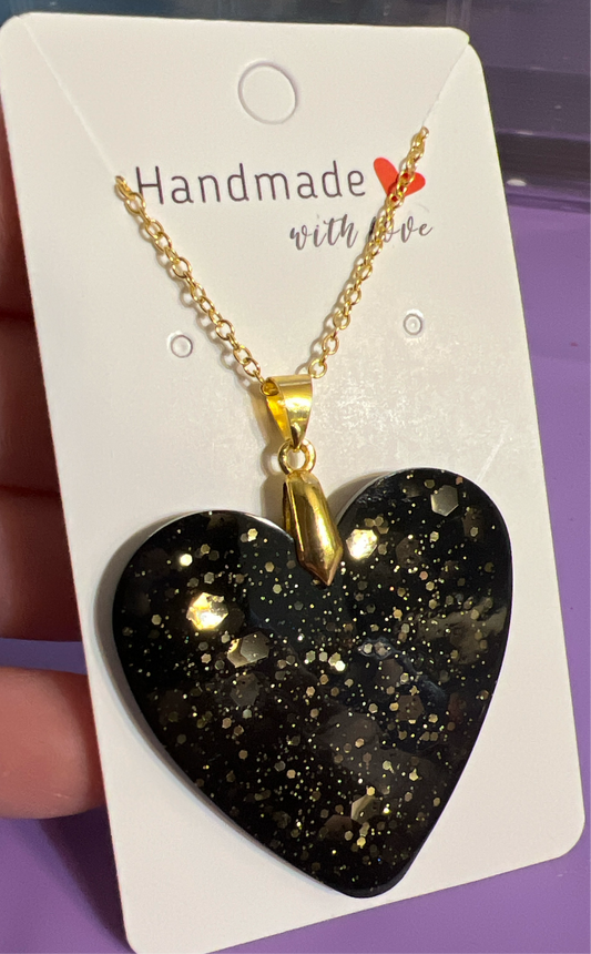 Black and gold heart