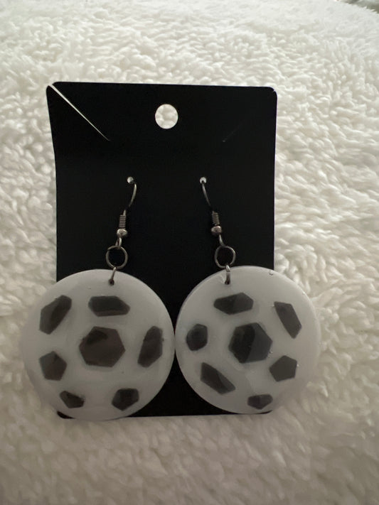 Black and white soccer balls